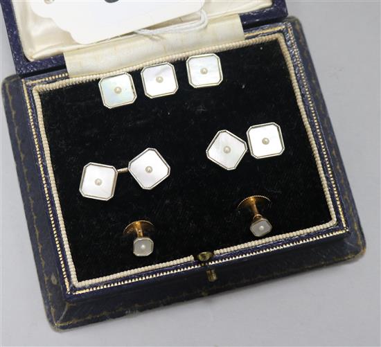 A cased set of 9ct gold mother of pearl and split pearl cufflinks and matching dress studs